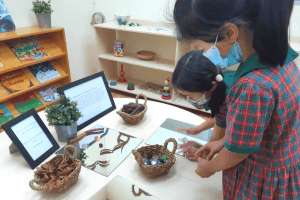 Two students at EtonHouse International School involved in school activities