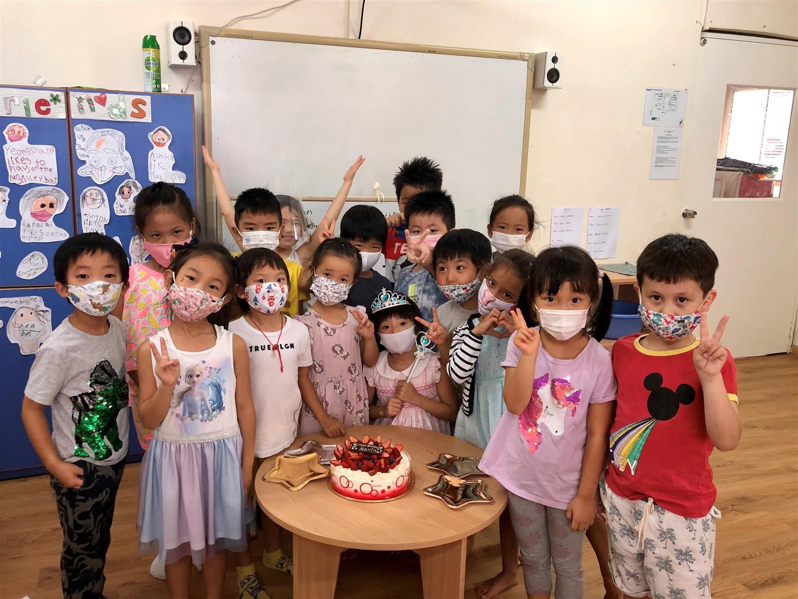 EtonHouse International School students celebrating Karin's birthday