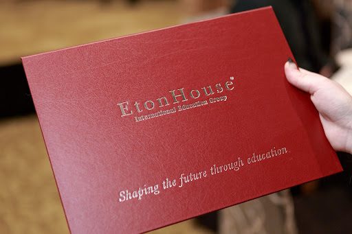 Red certificate given by EtonHouse to graduates