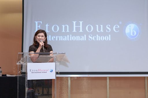 Female speaker making a speech during an Etonhouse event