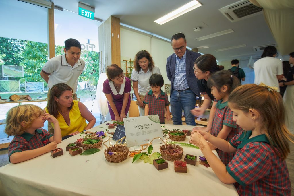 Children participating in a group activity at EtonHouse