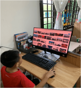 Student searching online for images of a building