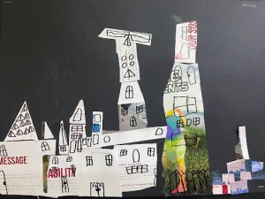 Various buildings made of newspaper clippings